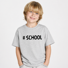 Lae piltide sirvija Boy wearing a light grey personalized kids’ T-shirt with black #SCHOOL text across the chest.